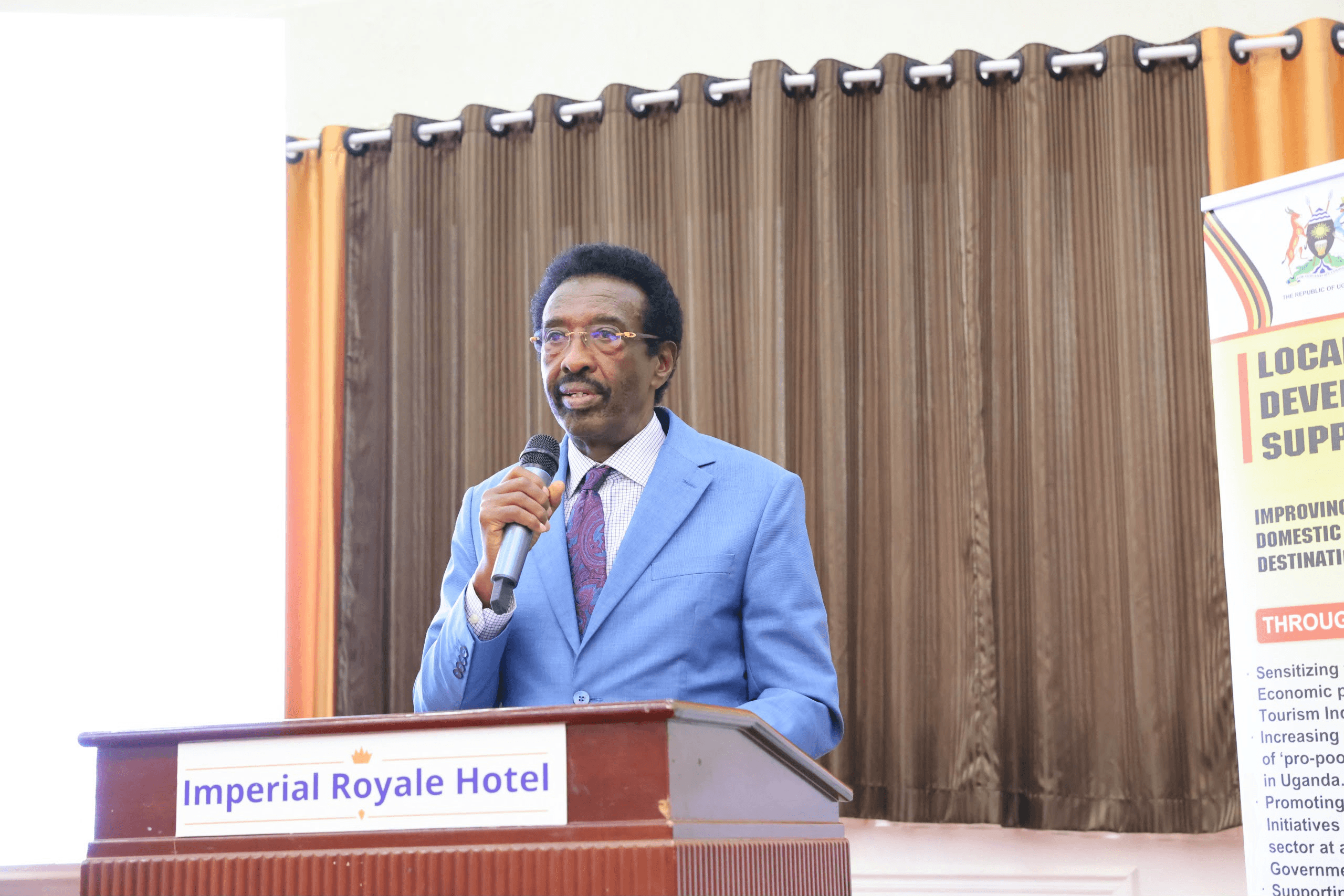 Minister Jim Muhwezi Highlights Security's Role in Protecting Government Programmes